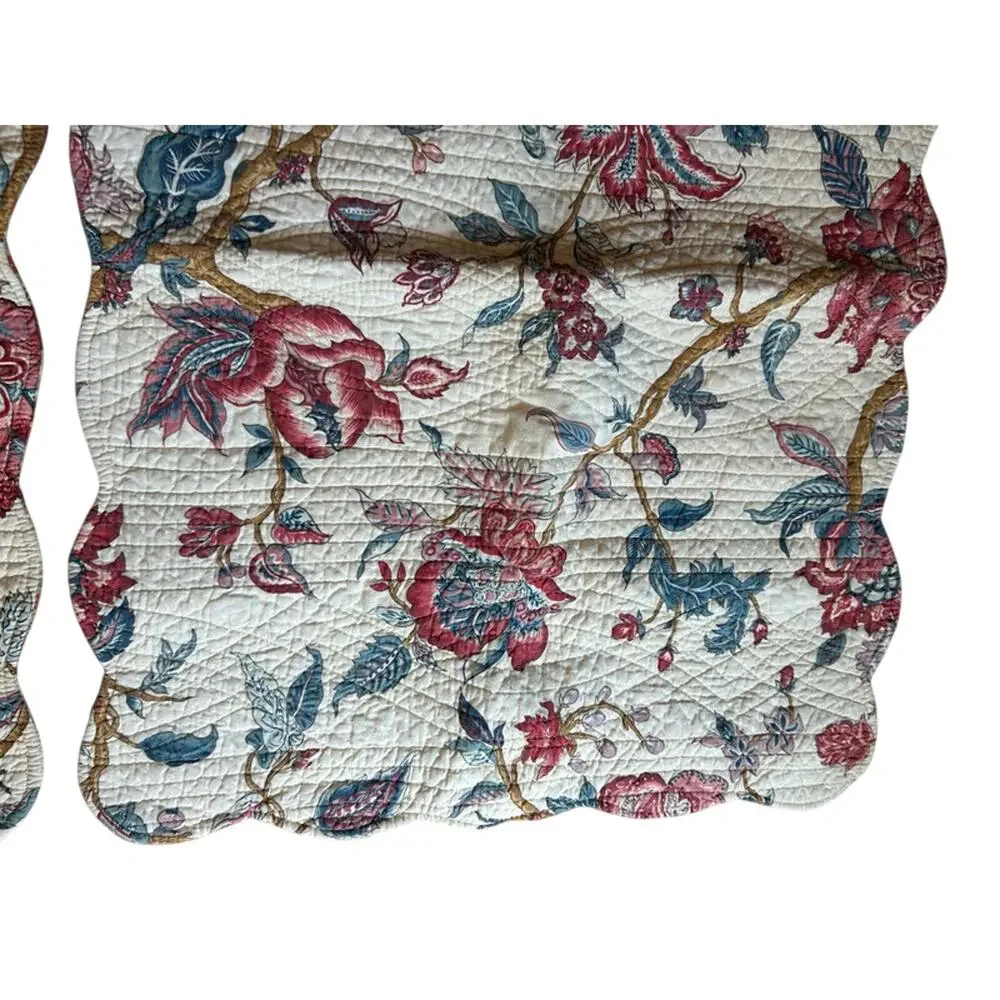 2 quilted floral standard pillow shams from Pottery Barn ?
